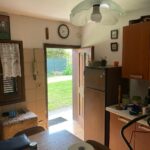 **EDOLO ZONA CENTRALE VENDESI BLOCALE AL PIANO TERRA DA RISTRUTTURARE, CON POSTO AUOT E GIARDINO PRIVATO**